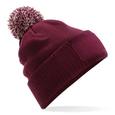 Gorro con pompón bicolor